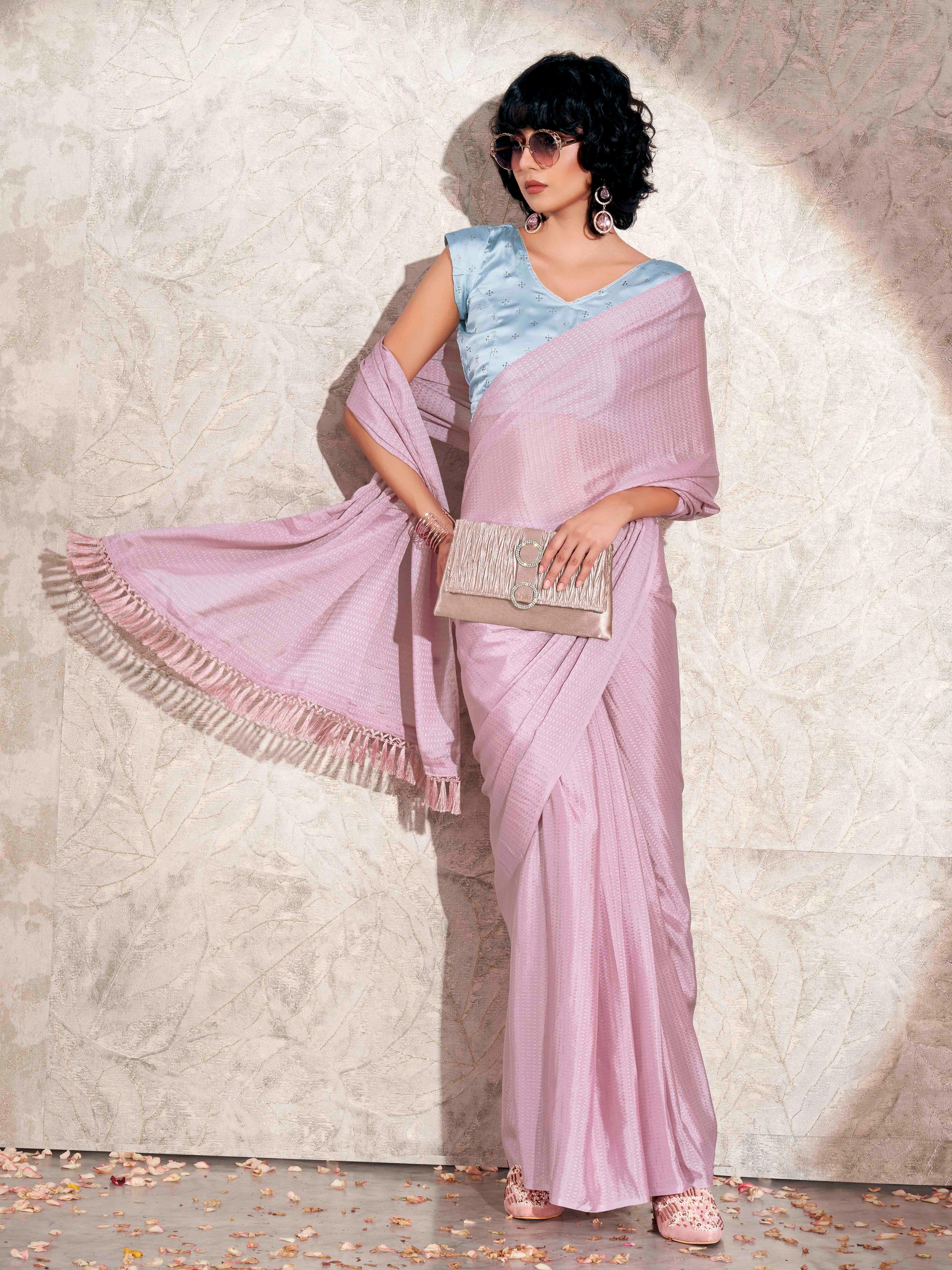 Pink colored jacquard saree with mukaish work satin blouse