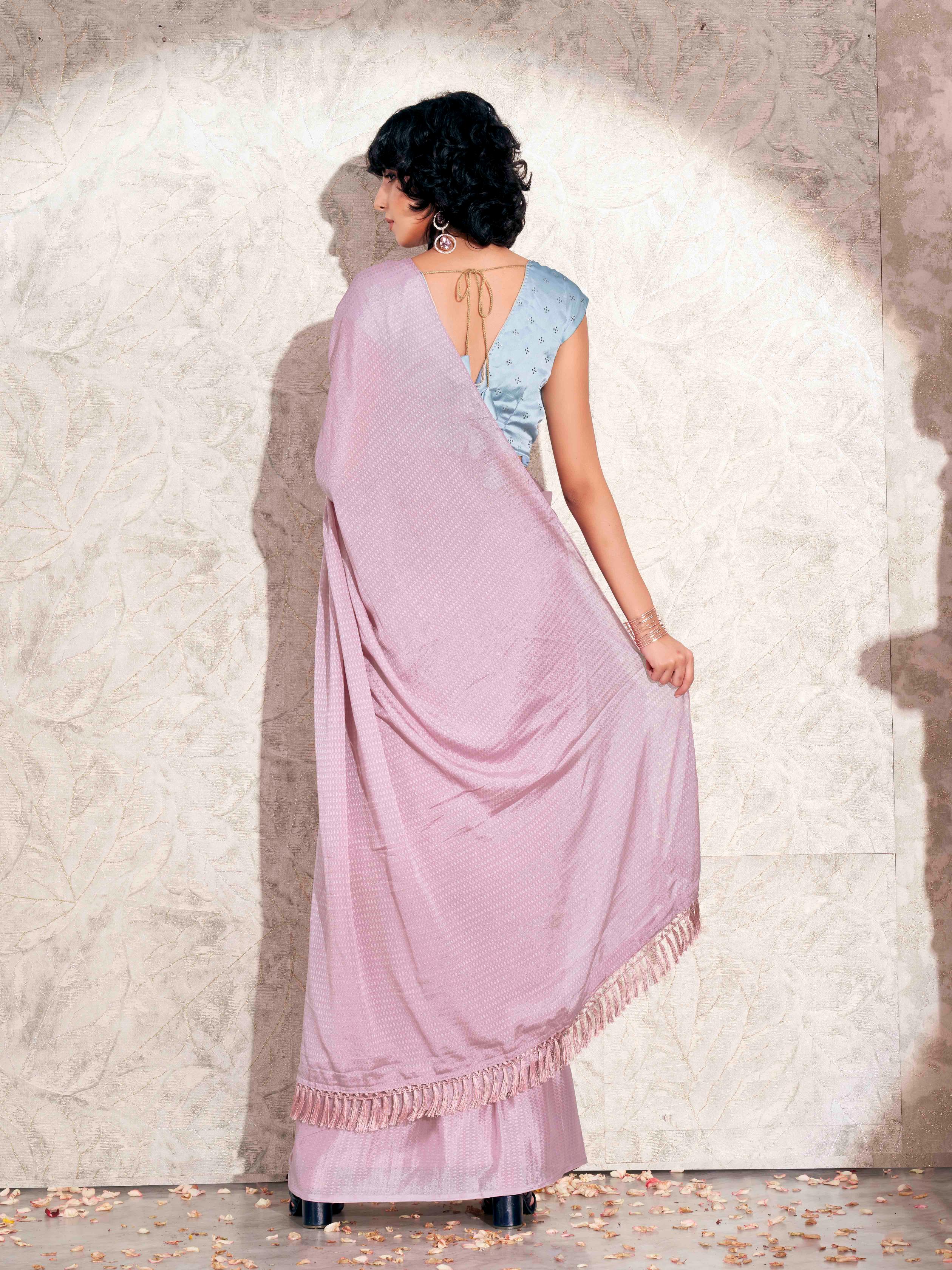 Pink colored jacquard saree with mukaish work satin blouse