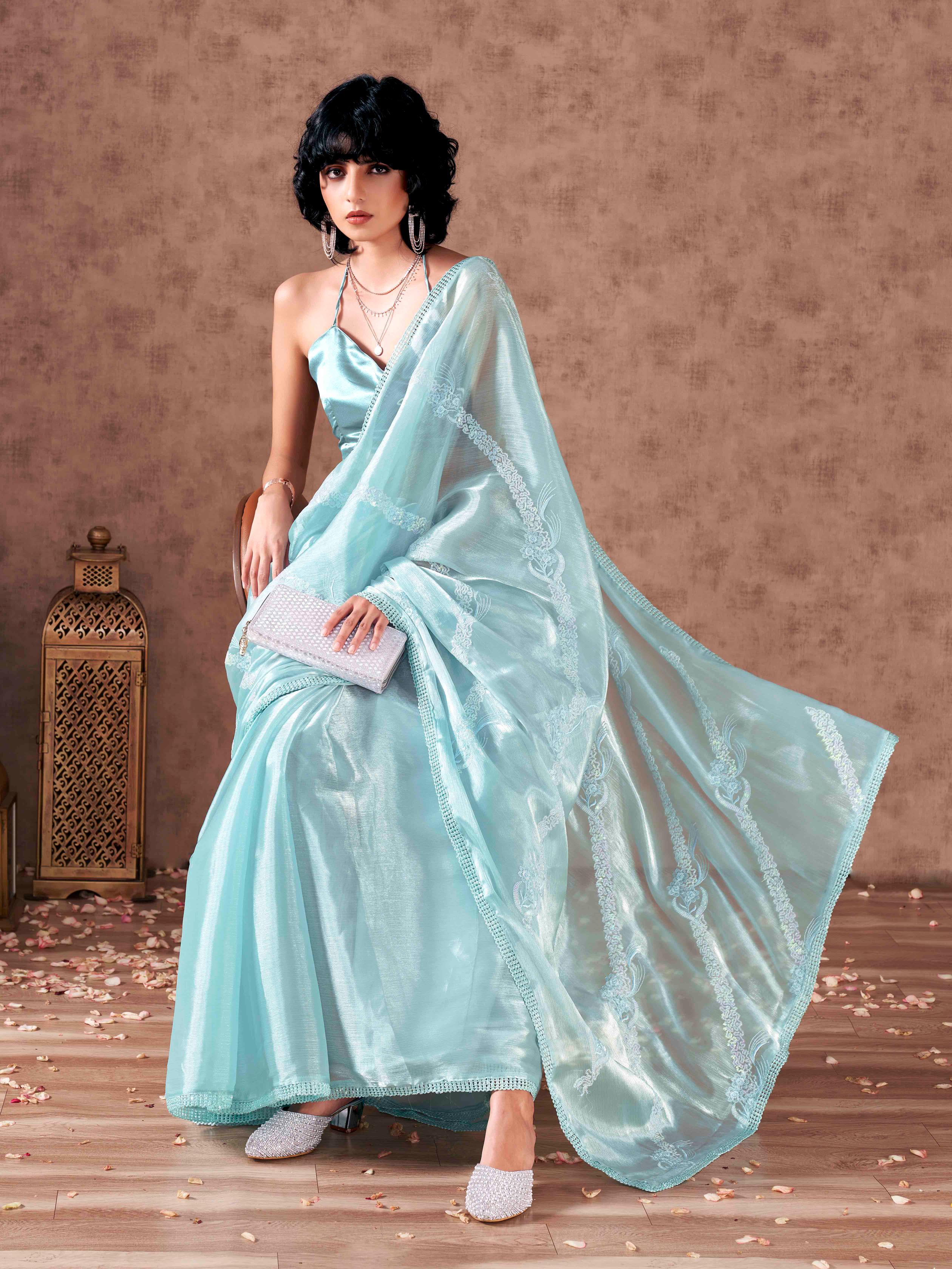 Half and half blue colored satin chiffon sequence embroidered saree with crochet lace