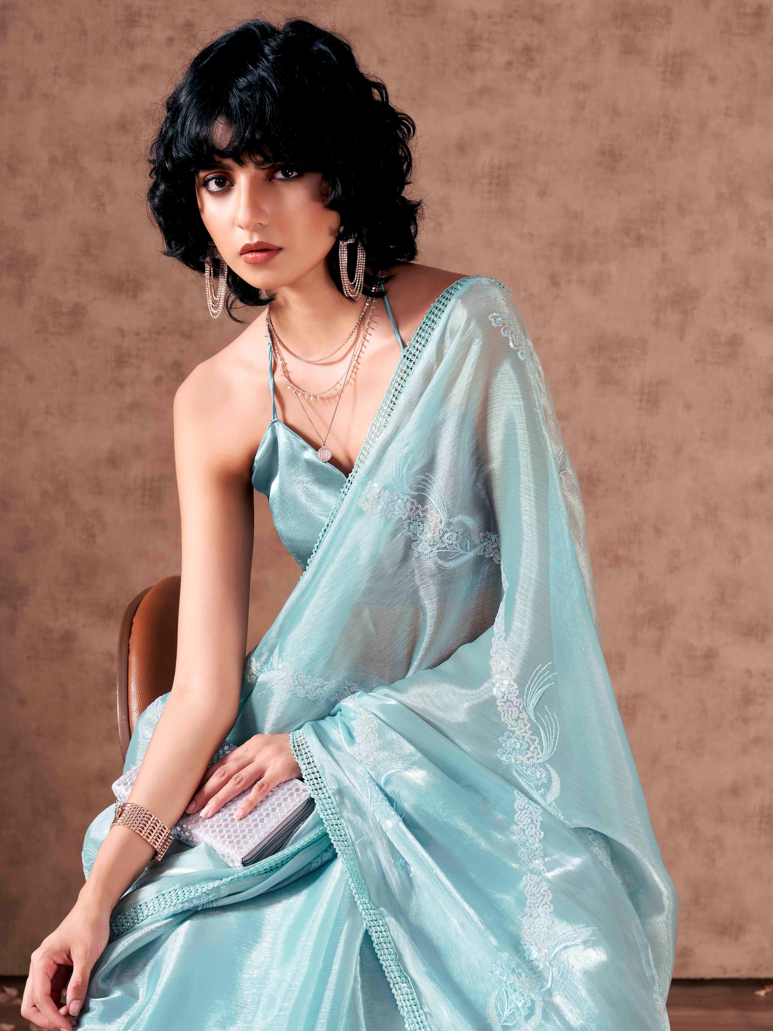 Half and half blue colored satin chiffon sequence embroidered saree with crochet lace