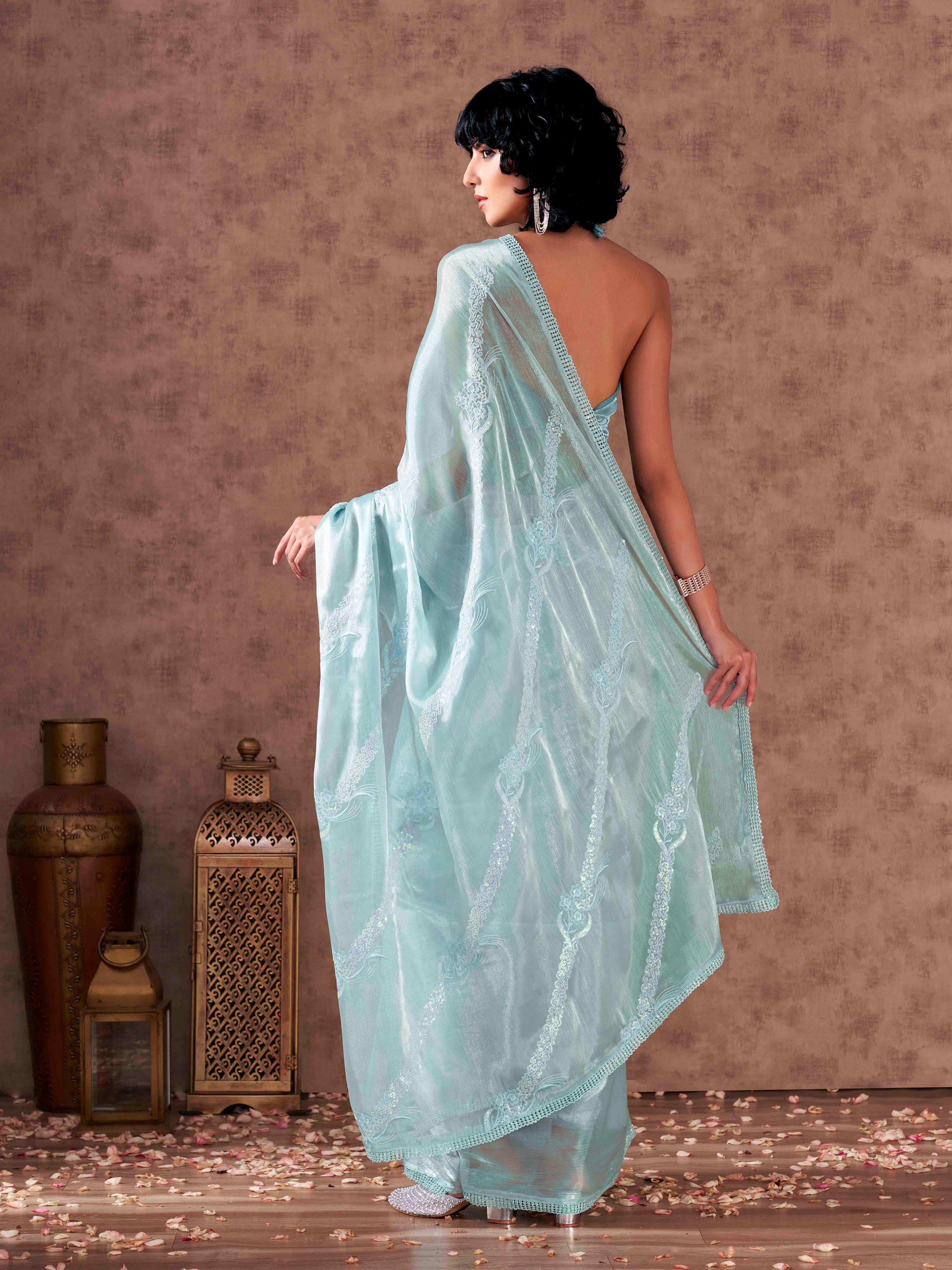 Half and half blue colored satin chiffon sequence embroidered saree with crochet lace