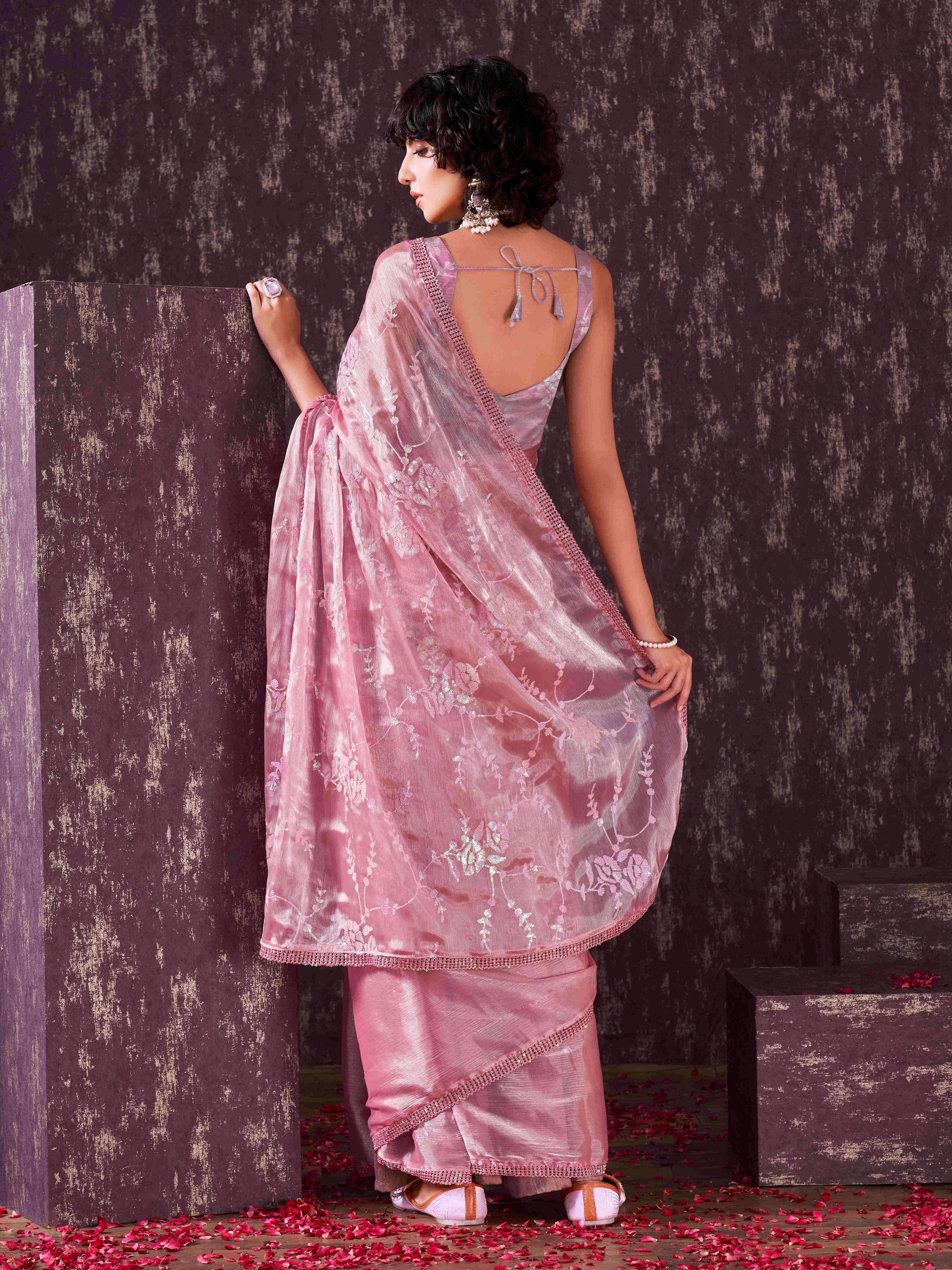 Half and half pink colored satin chiffon sequence embroidered saree with crochet lace