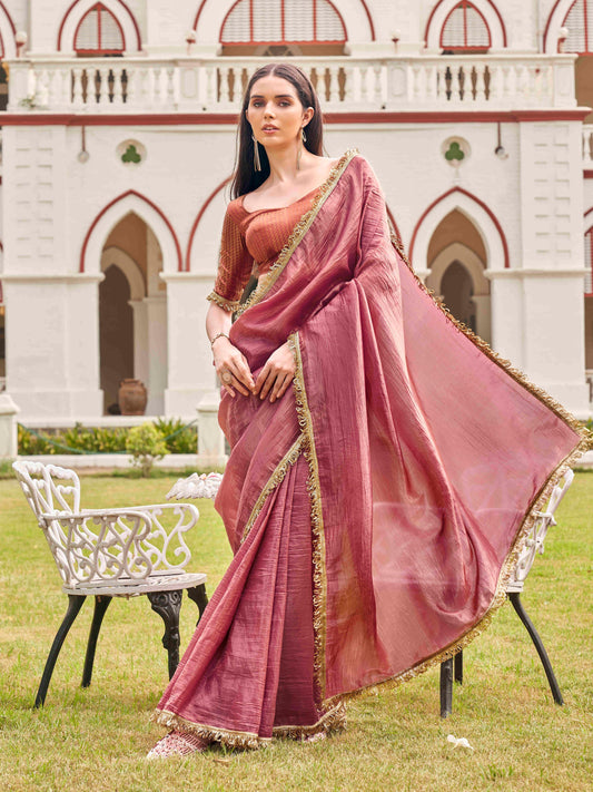 Pink colored crushed organza saree with designer lace and brocade blouse