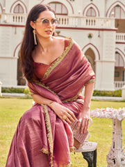 Pink colored crushed organza saree with designer lace and brocade blouse