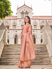 Peach colored crushed organza saree with designer lace and brocade blouse