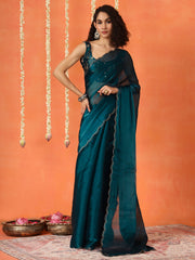 Teal colored satin chiffon saree with embroiderd blouse and scalloped border