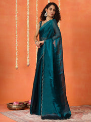 Teal colored satin chiffon saree with embroiderd blouse and scalloped border