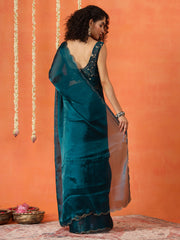 Teal colored satin chiffon saree with embroiderd blouse and scalloped border