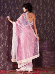 Pink colored supernet saree with faux mirror embroidery and crochet lace