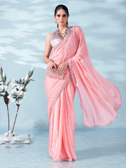 Peach colored satin foil printed saree with embellished lace