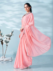 Peach colored satin foil printed saree with embellished lace