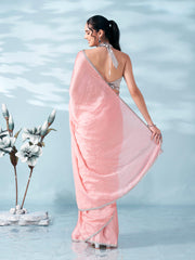 Peach colored satin foil printed saree with embellished lace