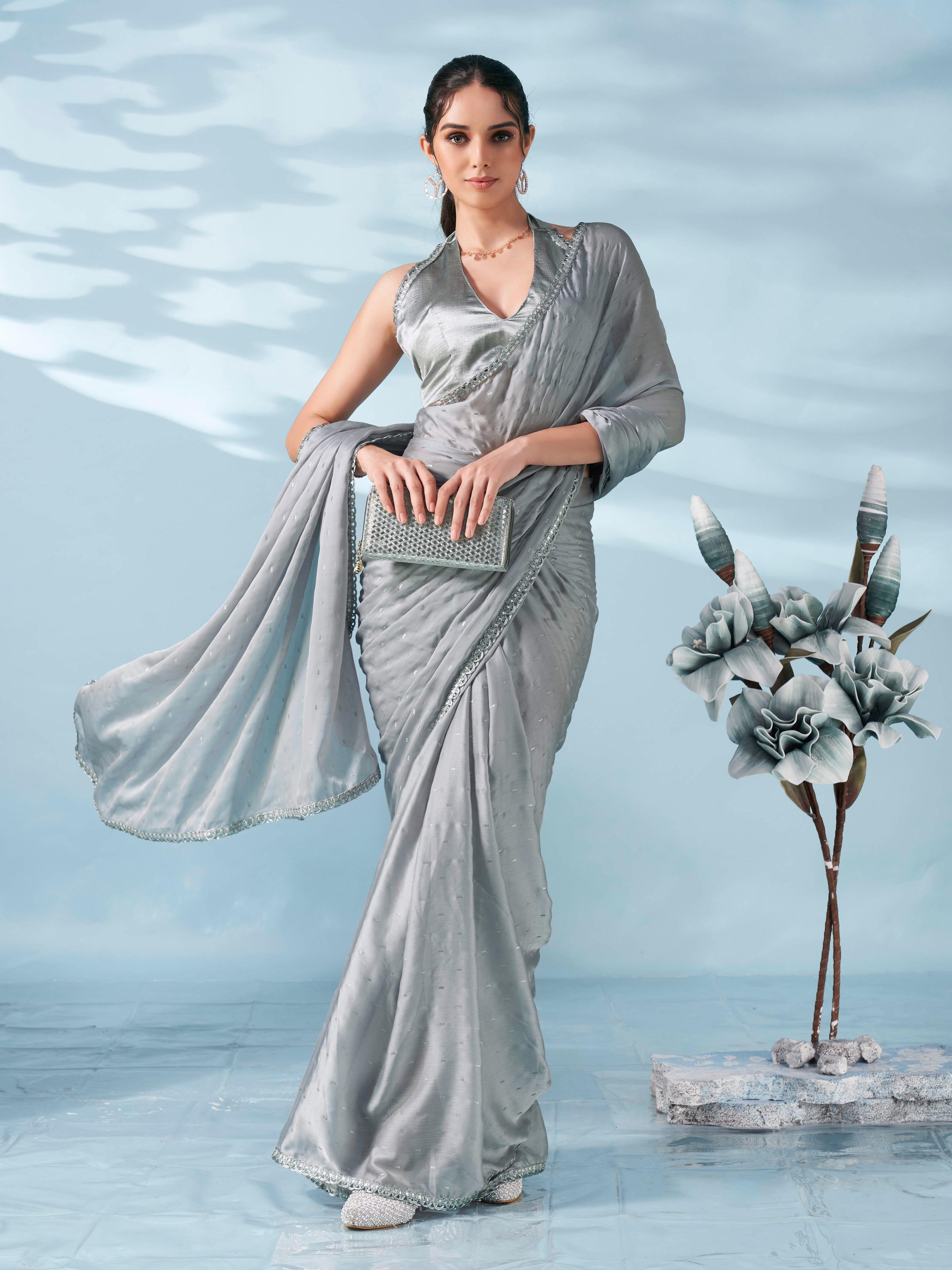 Silver colored satin foil printed saree with embellished lace