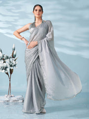 Silver colored satin foil printed saree with embellished lace