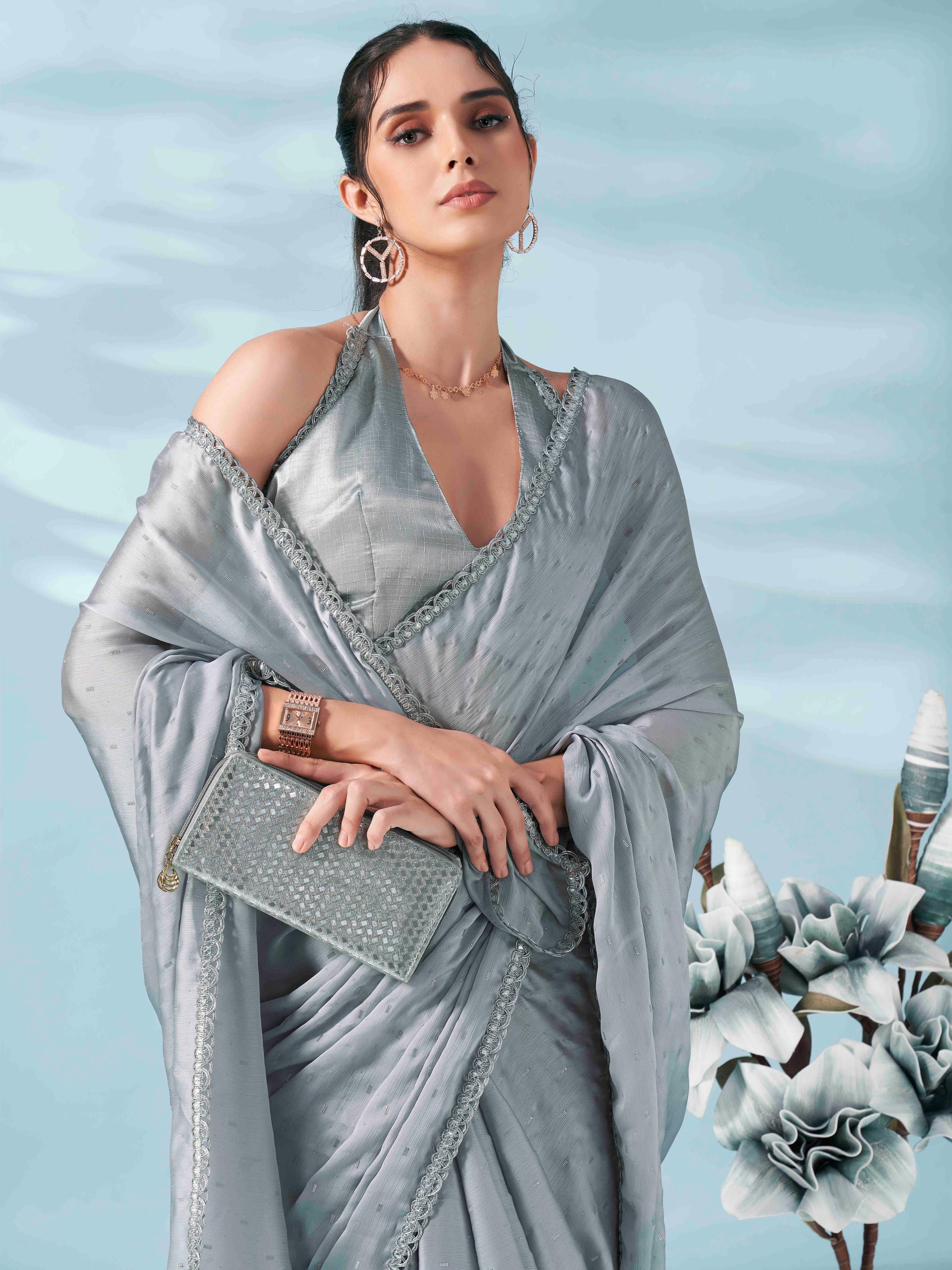 Silver colored satin foil printed saree with embellished lace