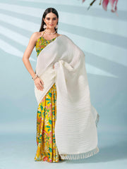 Cream and yellow colored digital floral print half and half crepe saree with tassle in pallu