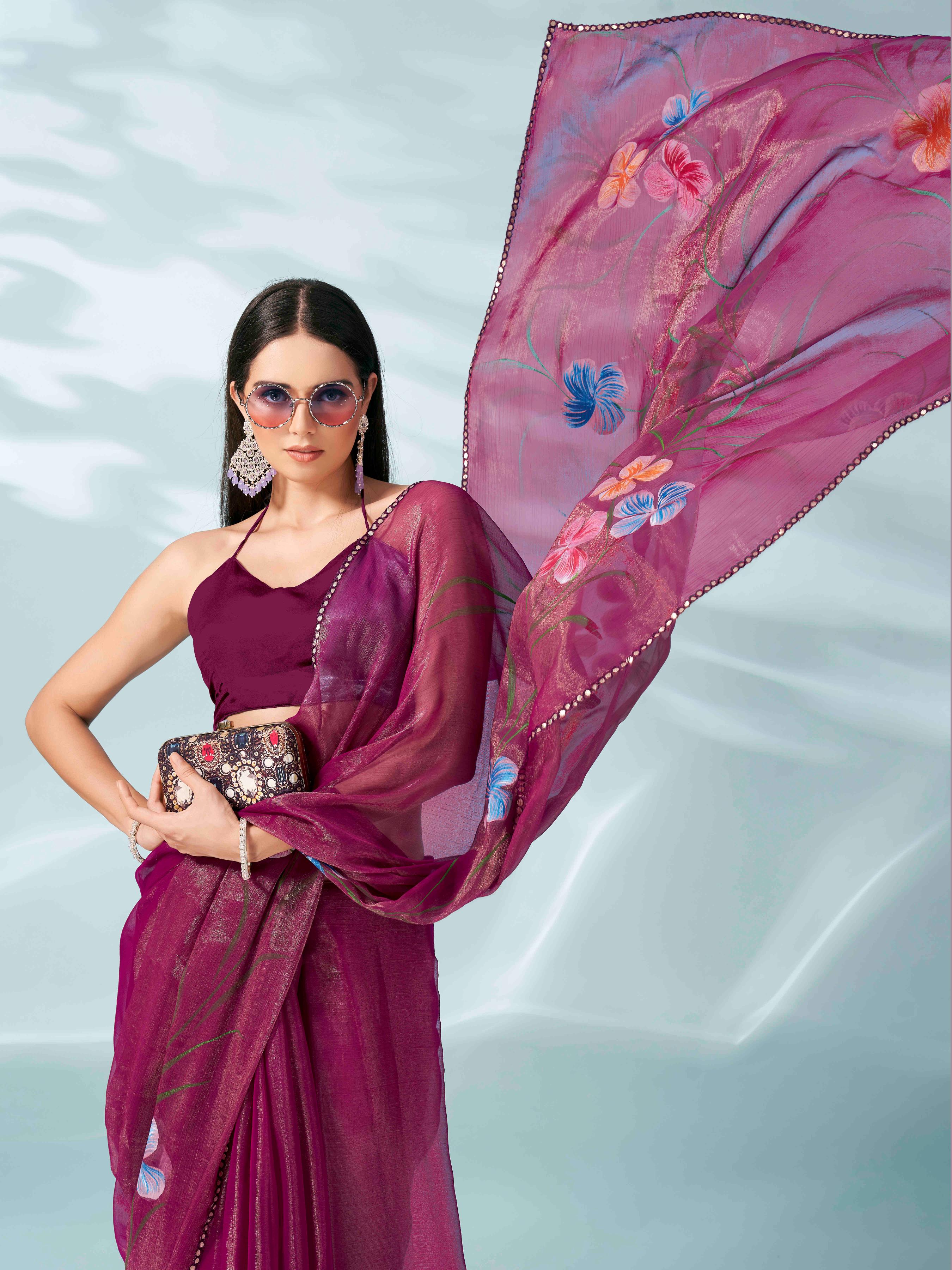 Rani colored shimmer chiffon saree with hand print and scalloped border