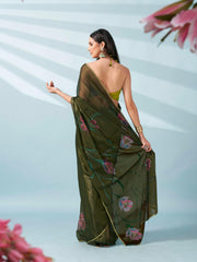 Green colored shimmer chiffon saree with hand print and scalloped border