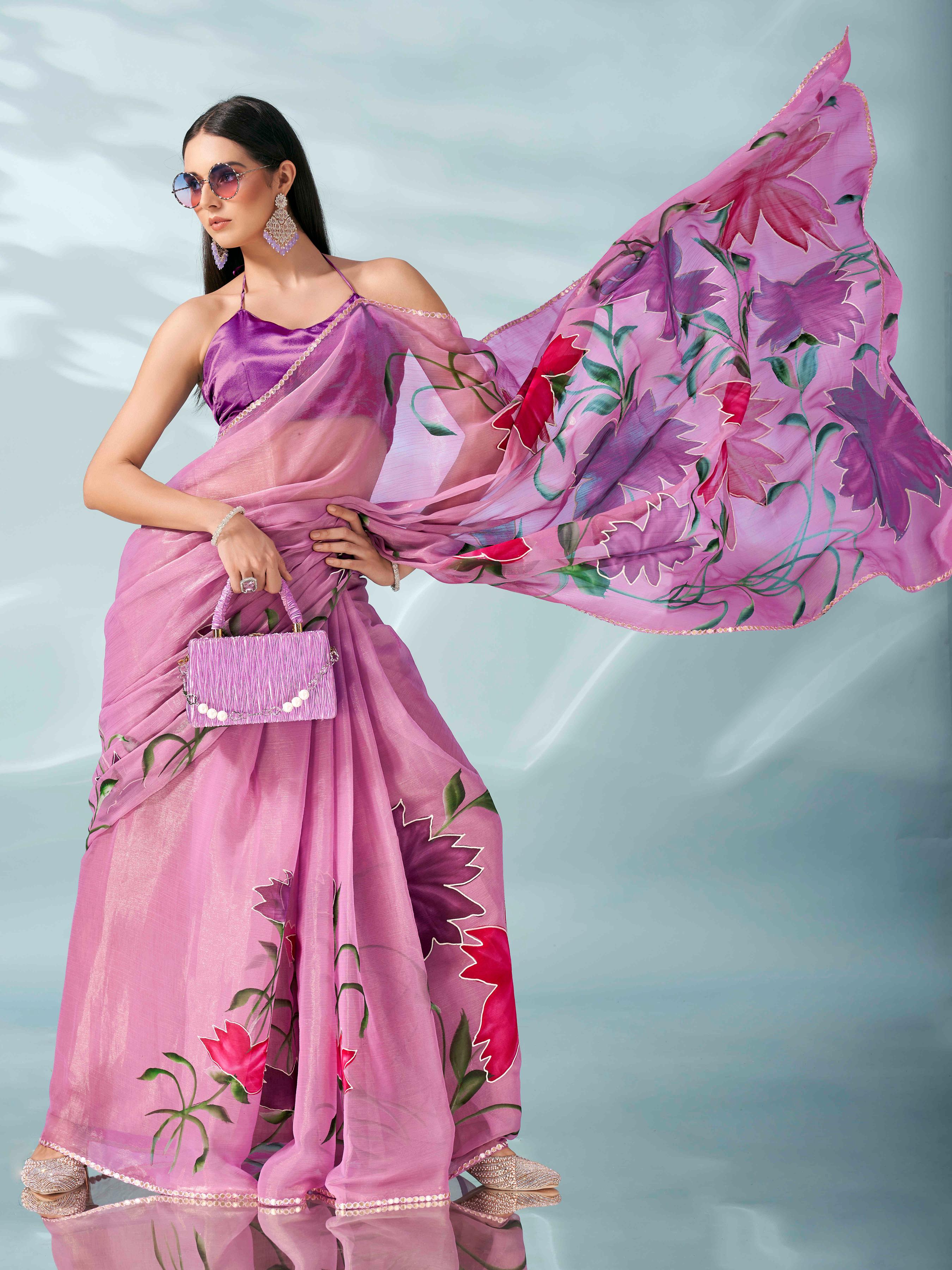 Pink colored shimmer chiffon saree with hand print and scalloped border