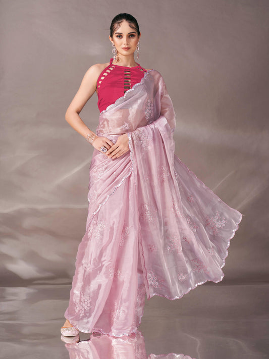 Baby pink colored shimmer satin saree with sequence embroidery and scalloped border