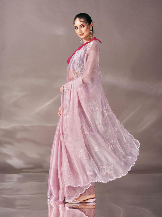 Baby pink colored shimmer satin saree with sequence embroidery and scalloped border