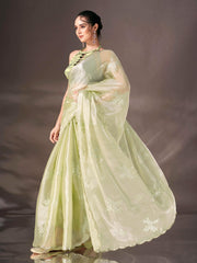 Pista green colored shimmer satin saree with sequence embroidery and scalloped border