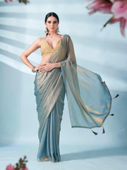 Blue and gold two tone shimmer chiffon saree with tassles in pallu and fancy lycra blouse