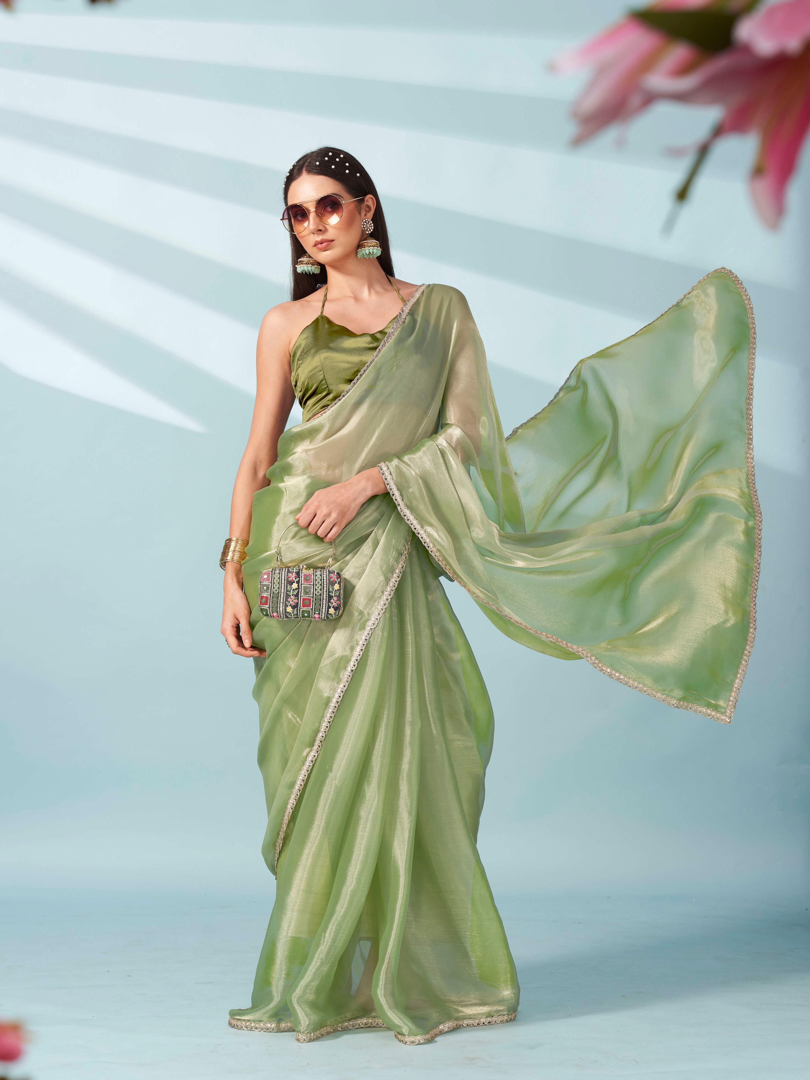 Green colored shimmer satin saree with embellished lace