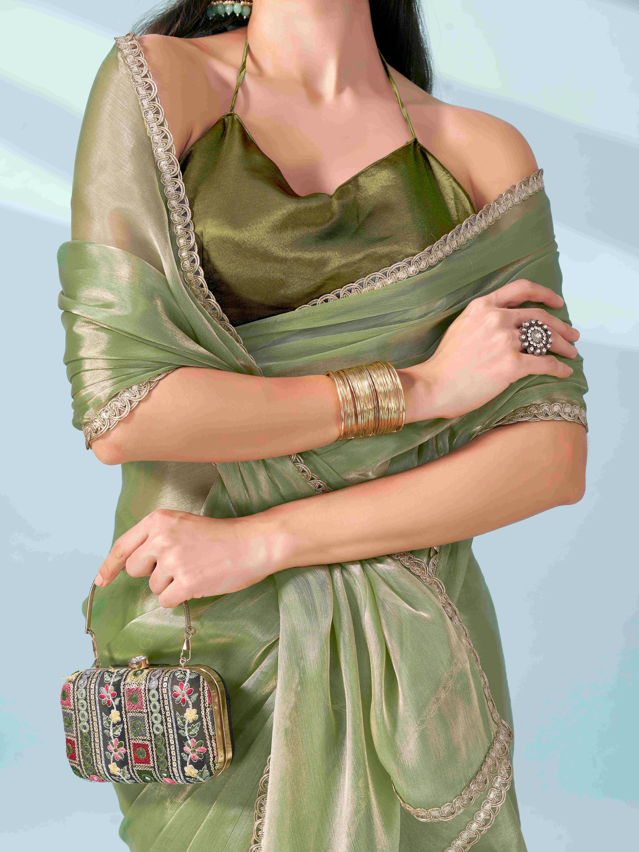 Green colored shimmer satin saree with embellished lace