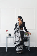 Ready to wear black and white traditional print poly cotton saree with woven border & tassles