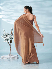 Two tone camel brown colored satin saree with tassles on pallu