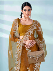 Mustard colored organza saree with gota patti embroidery and embellished border