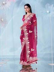 Burgundy colored organza saree with gota patti embroidery and embellished border