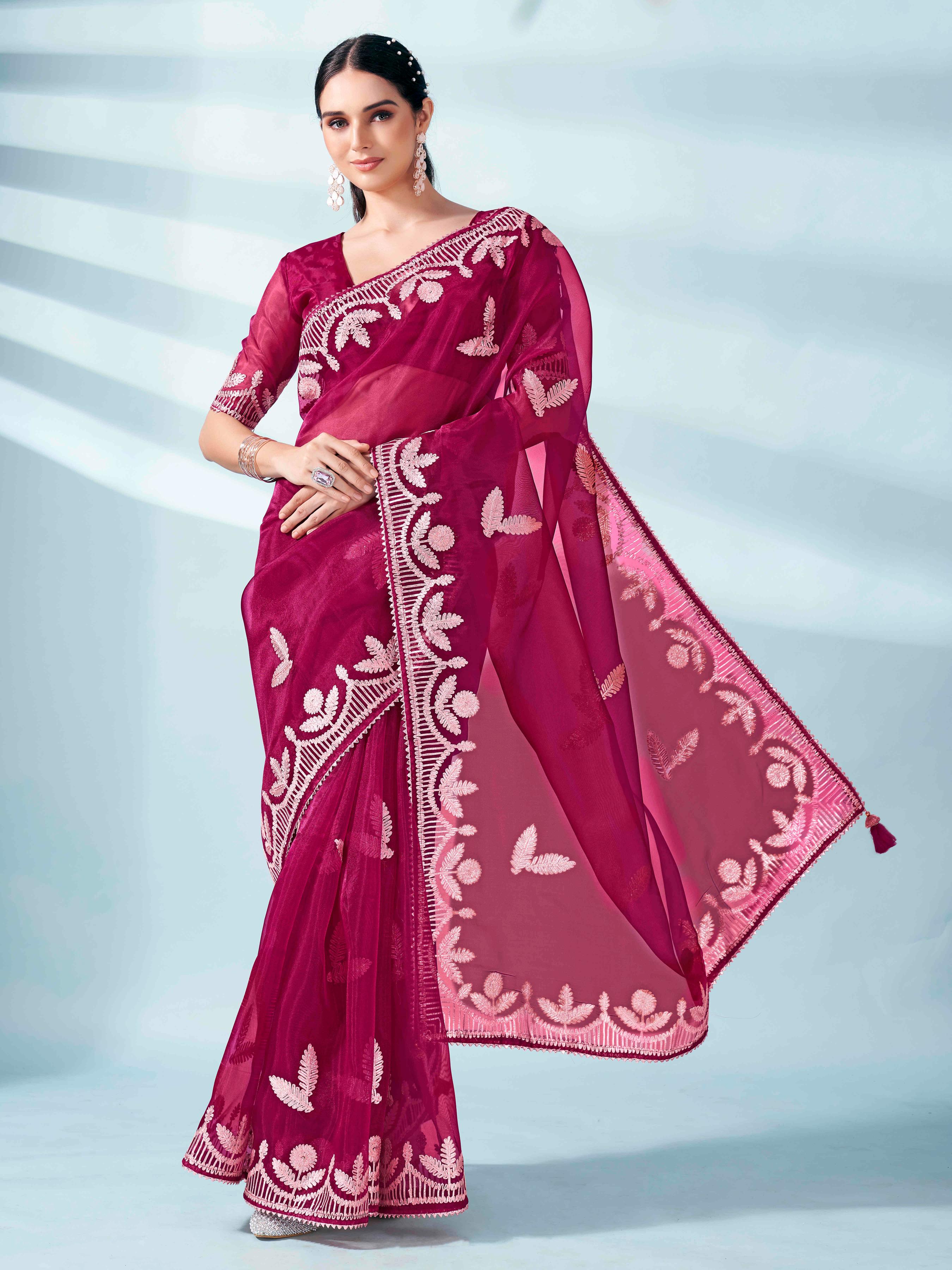 Burgundy colored organza saree with gota patti embroidery and embellished border