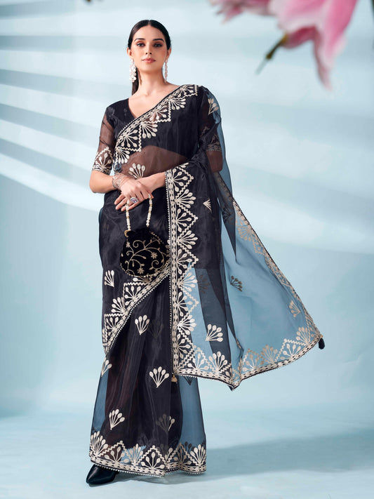 Black colored organza saree with gota patti embroidery and embellished border