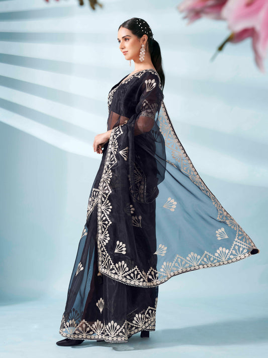 Black colored organza saree with gota patti embroidery and embellished border