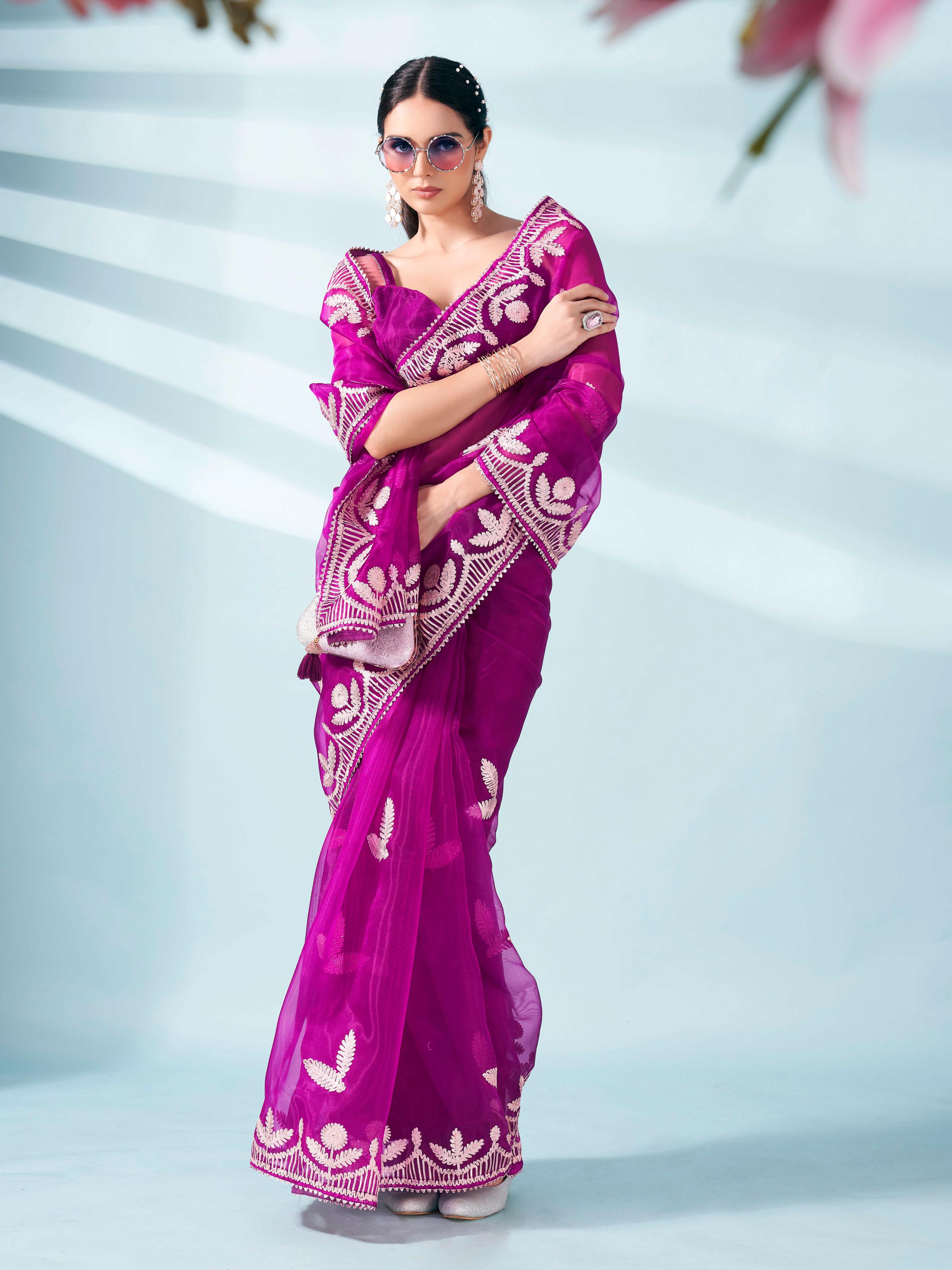 Magenta colored organza saree with gota patti embroidery and embellished border