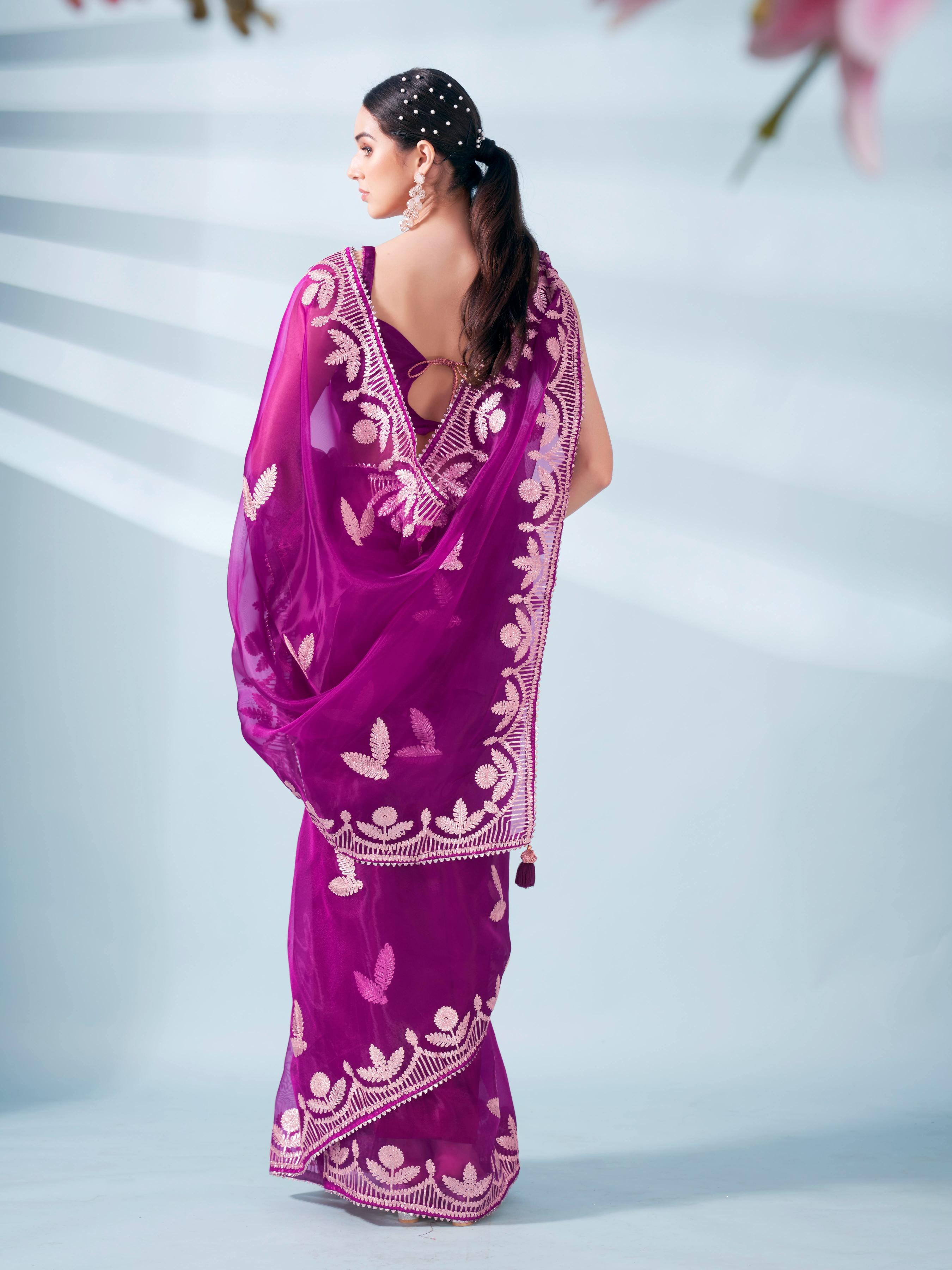 Magenta colored organza saree with gota patti embroidery and embellished border