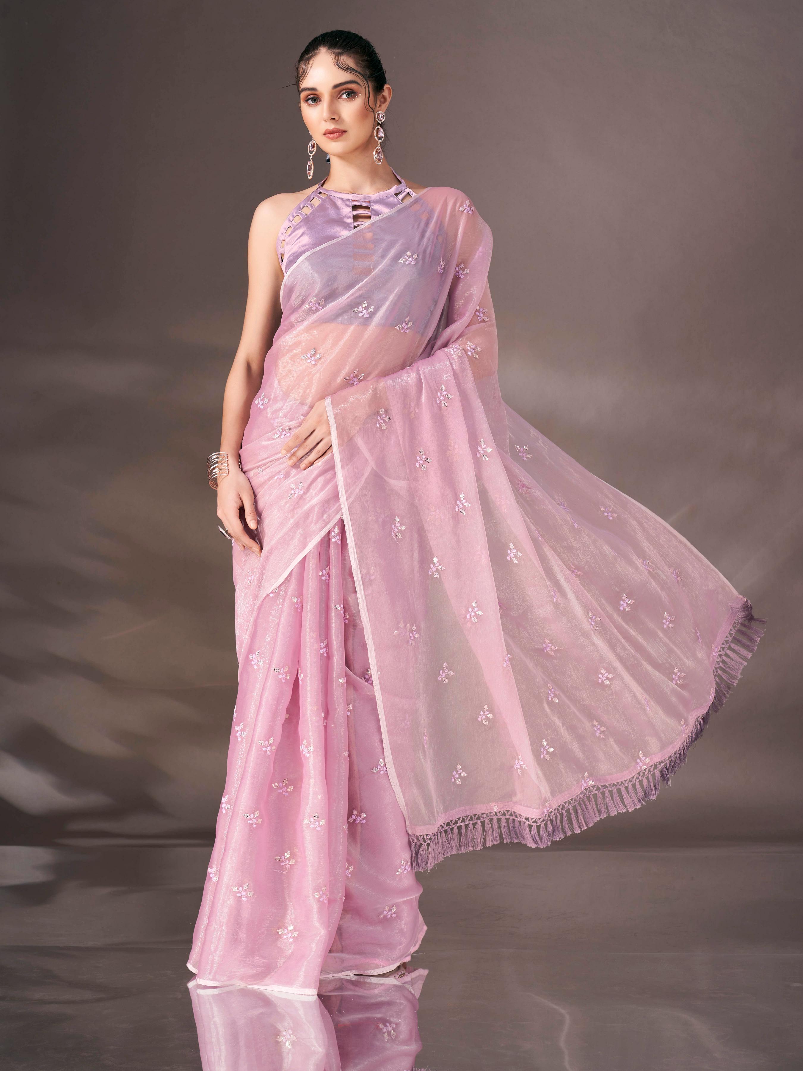 Mauve colored sequin embroidered shimmer chiffon saree with tassles on pallu