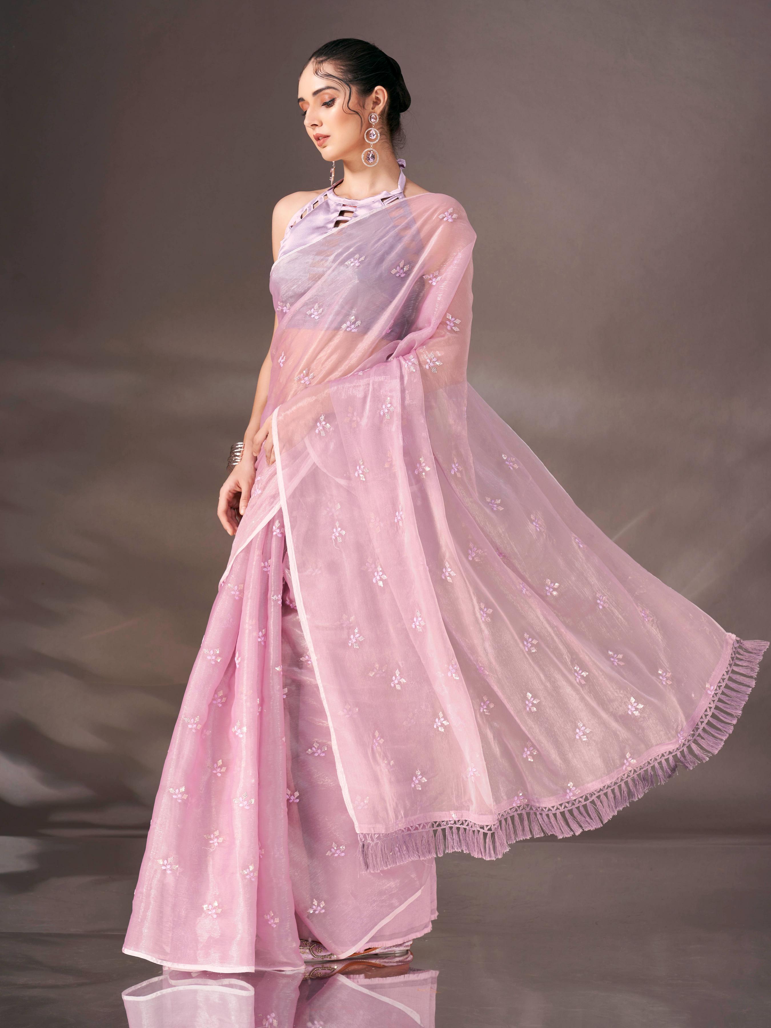 Mauve colored sequin embroidered shimmer chiffon saree with tassles on pallu