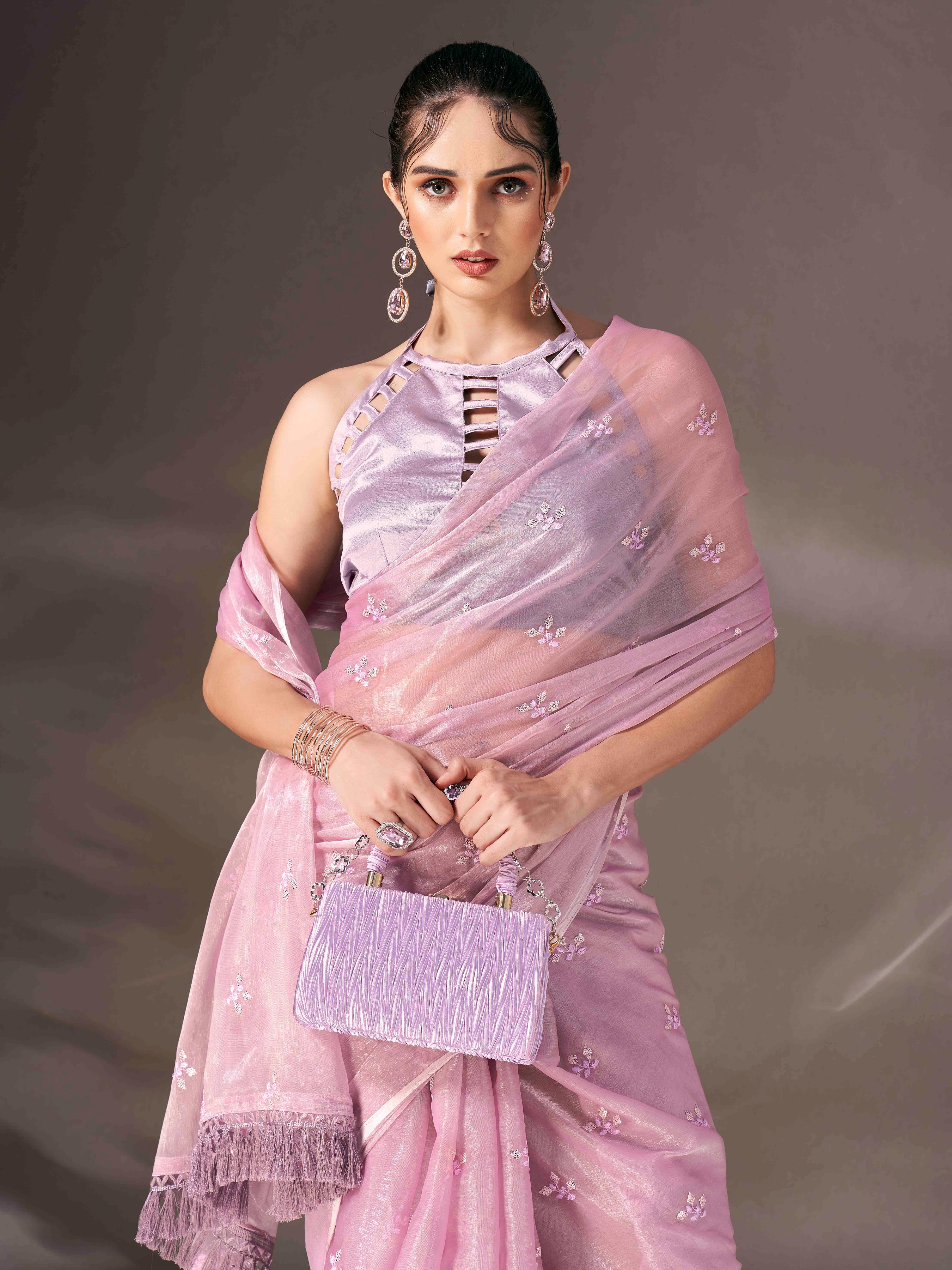 Mauve colored sequin embroidered shimmer chiffon saree with tassles on pallu