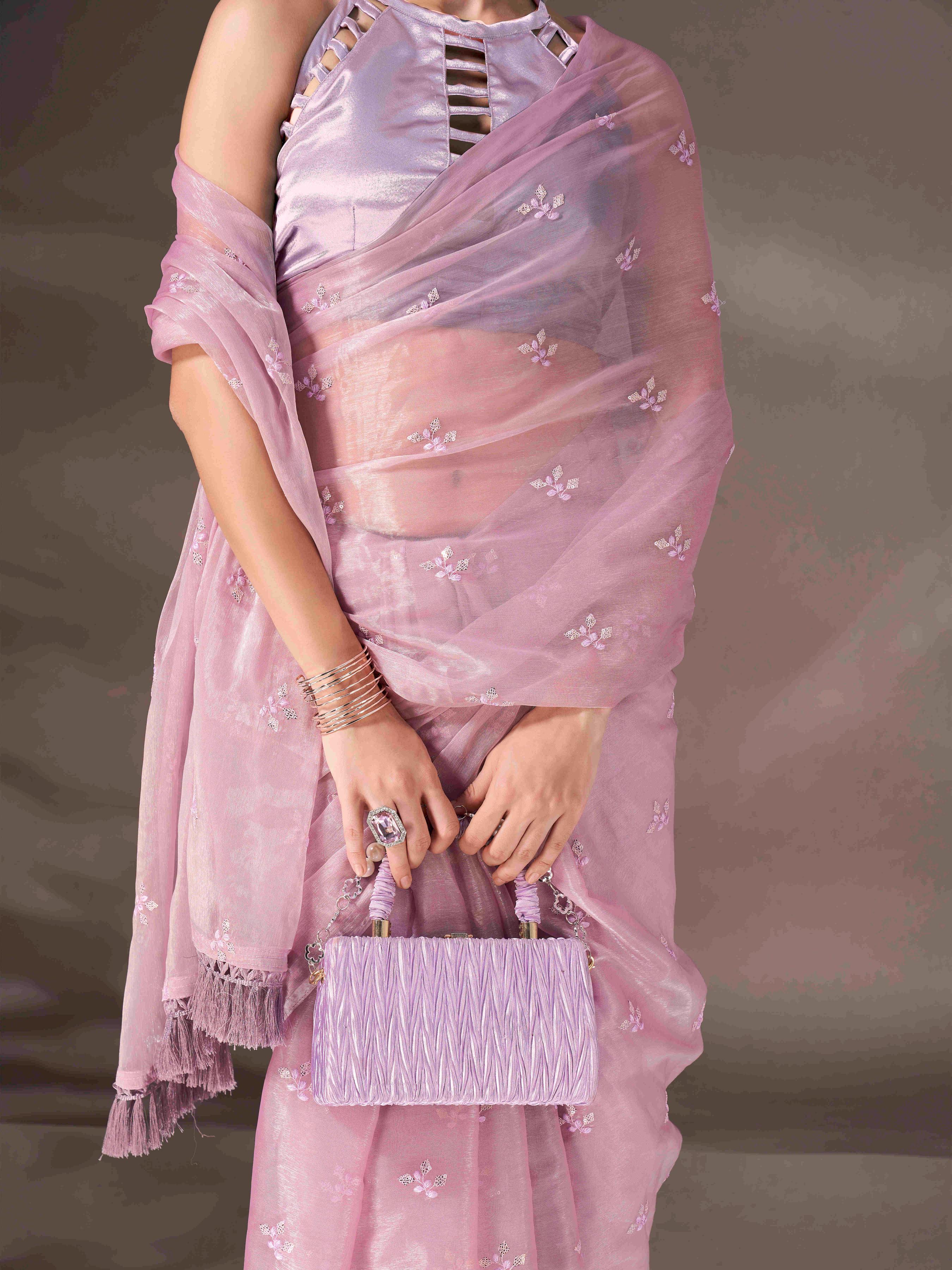 Mauve colored sequin embroidered shimmer chiffon saree with tassles on pallu