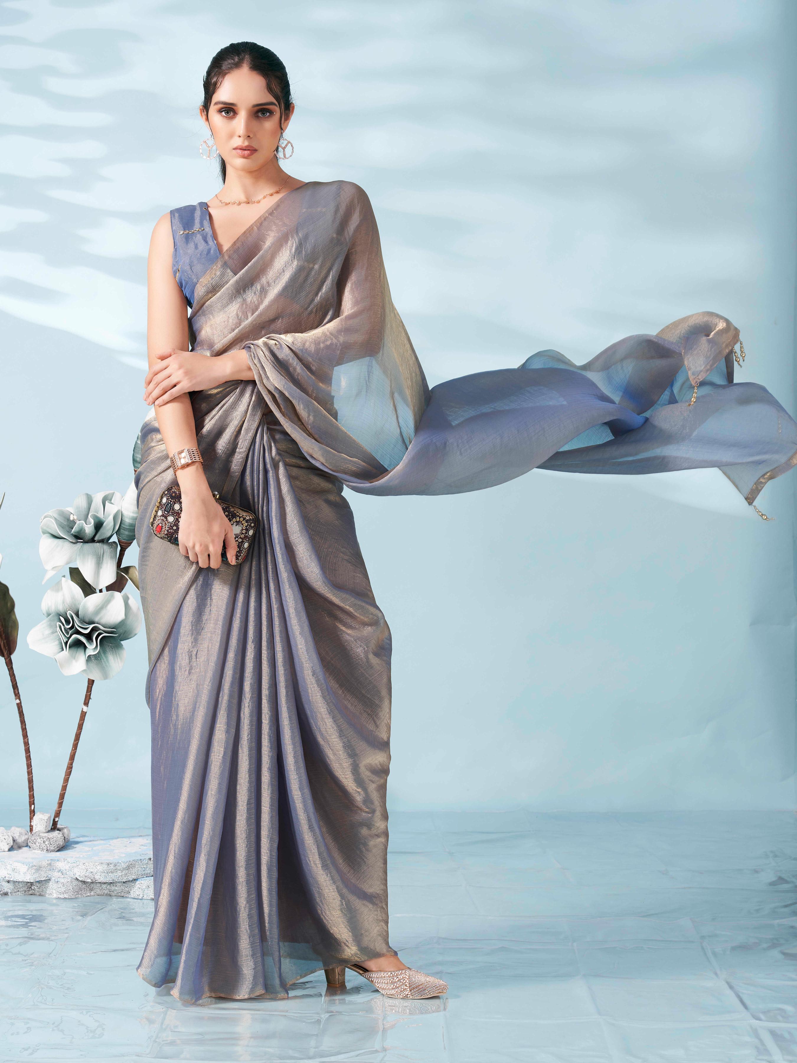 Blue & copper colored two tone chiffon saree with faux mirror embroidered blouse