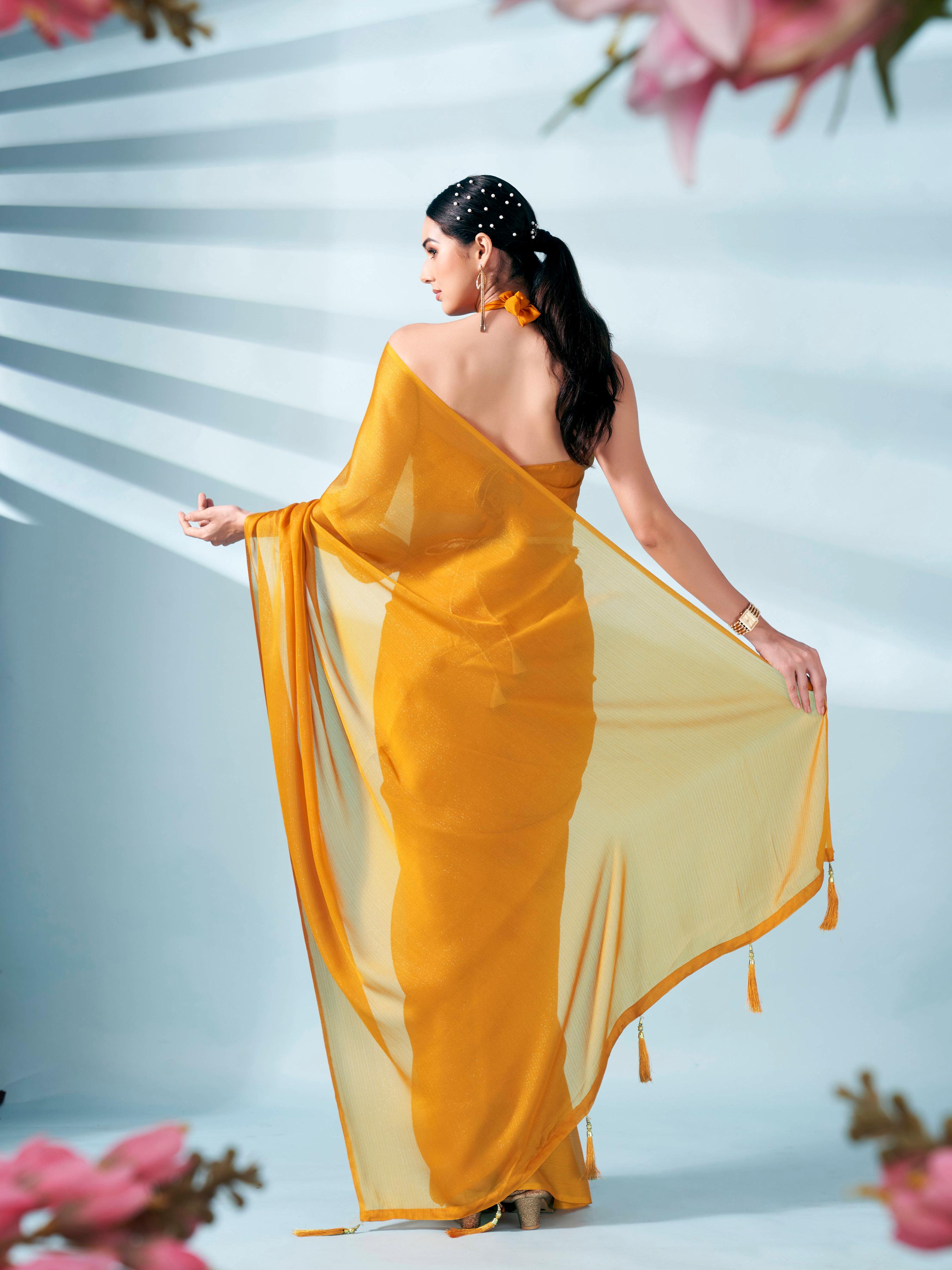 Mustard colored zari weaving satin saree with sequinned belt