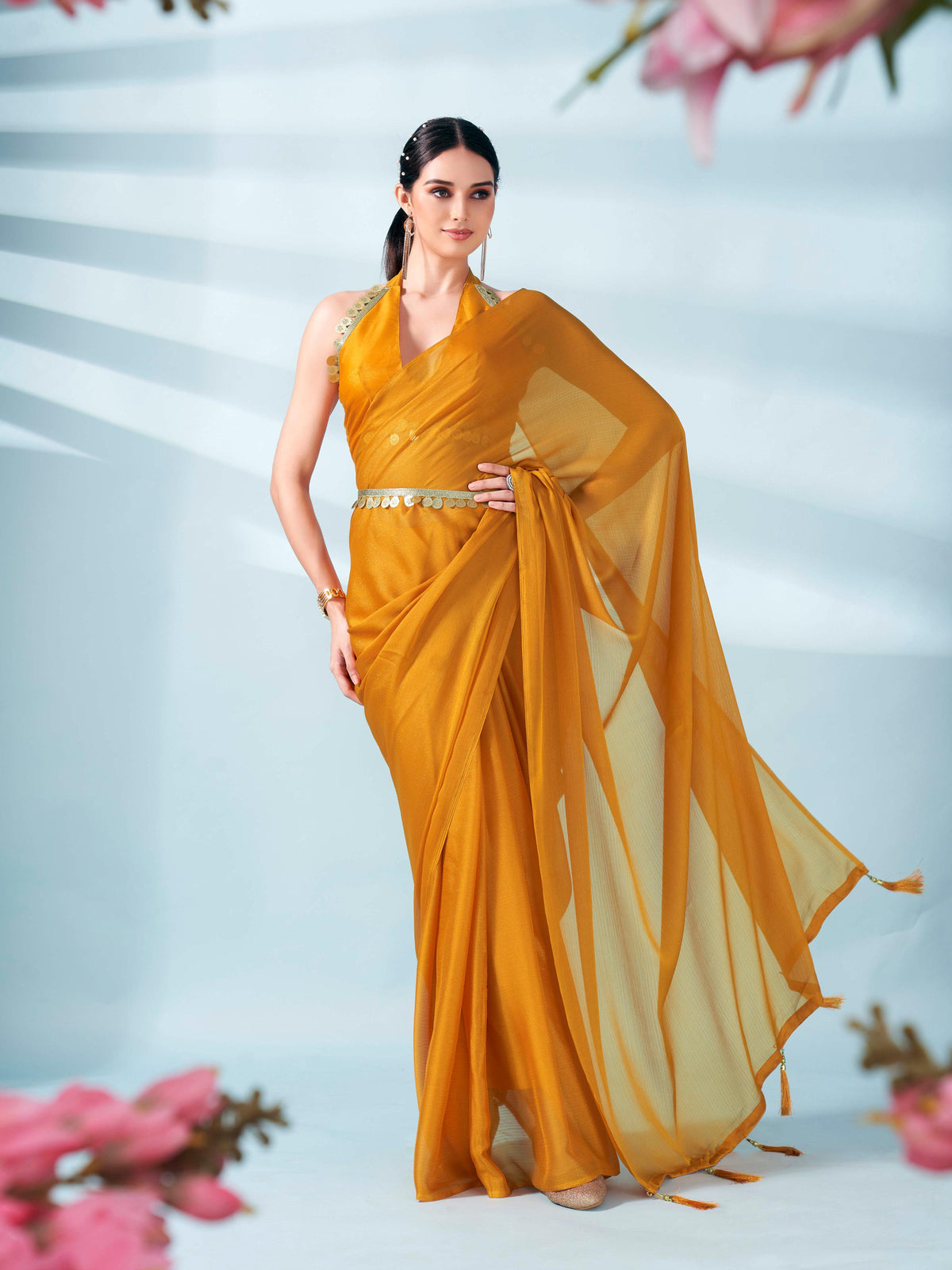 Mustard colored zari weaving satin saree with sequinned belt