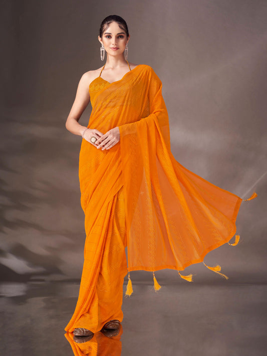 Mustard colored striped saree with tassles on pallu