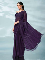 Purple colored lurex zari butti and satin border saree with tassles on palliu