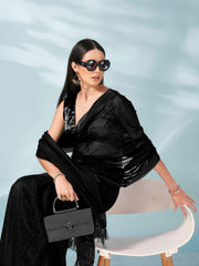 Black colored lurex zari butti and satin border saree with tassles on palliu