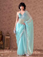 Blue colored shimmer chiffon saree with embellished lace and blouse