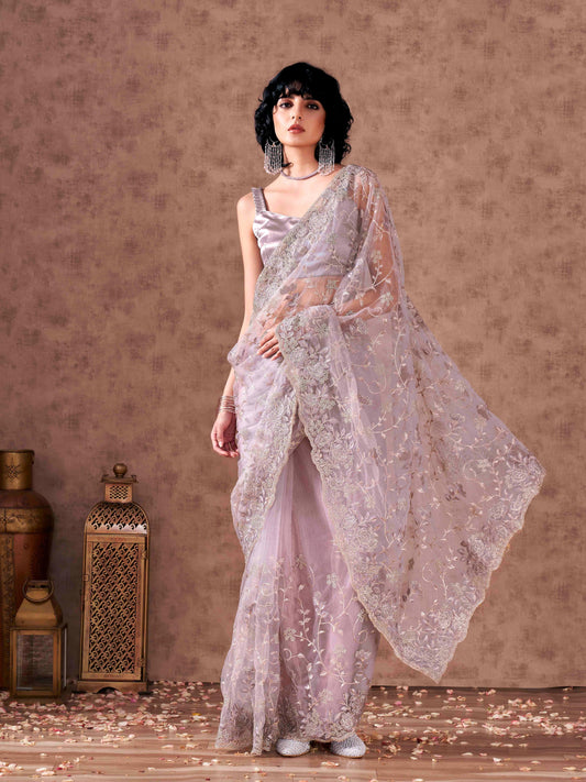 Mauve colored heavy embroidered net saree